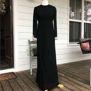 Stunning mid century black maxi dress with Pearl and crystal sleeves.